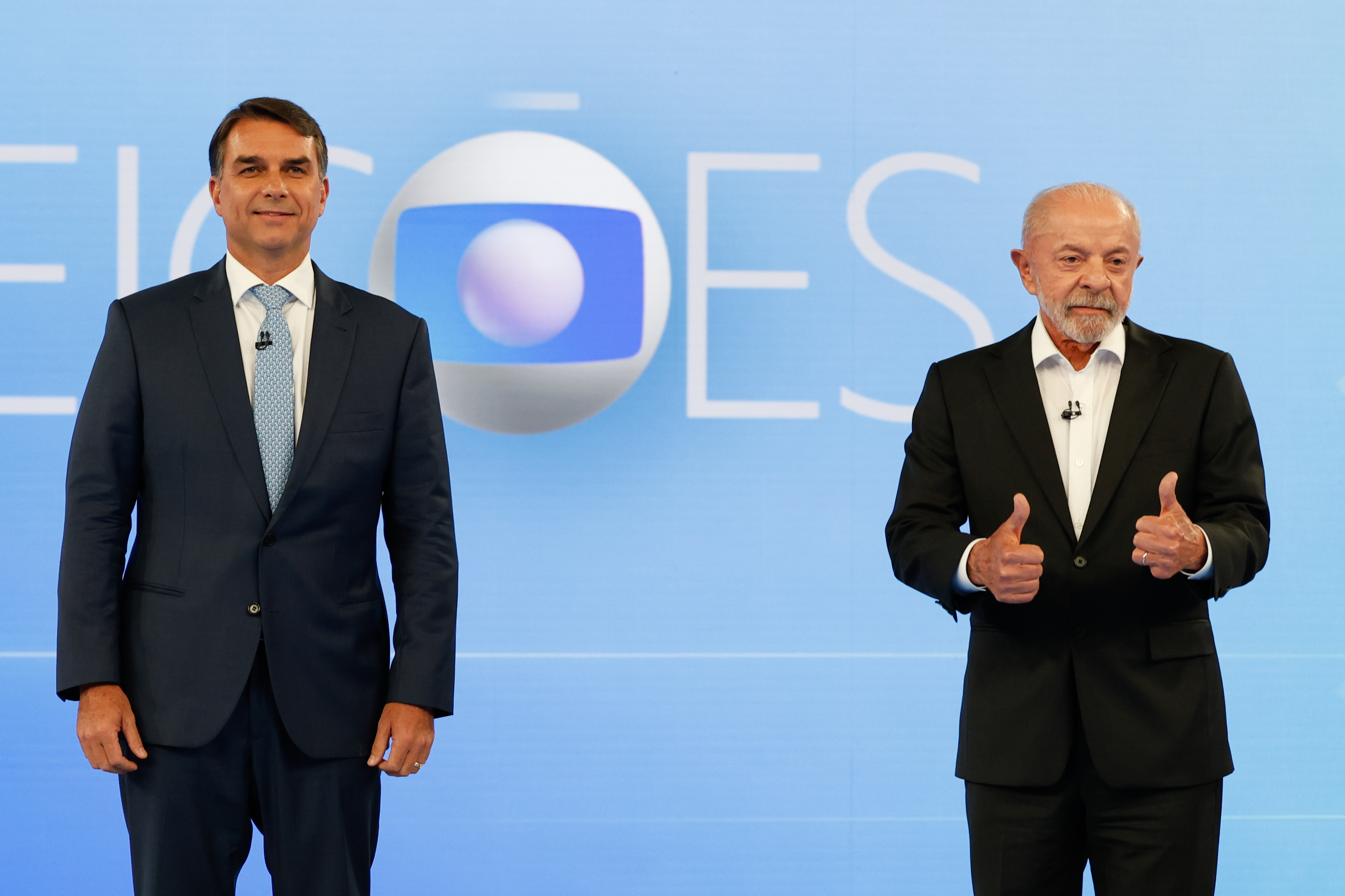 Lula e Flávio Bolsonaro durante o debate do segundo turno na TV Globo